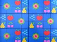 fruit and flowers on a blue background